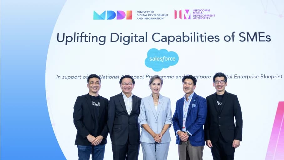 IMDA, MDDI and Salesforce leaders on stage at SMEs Go Digital Day 2026 under the banner Uplifting Digital Capabilities of SMEs.